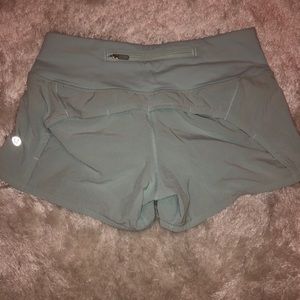 Light aqua colored lululemon shorts
